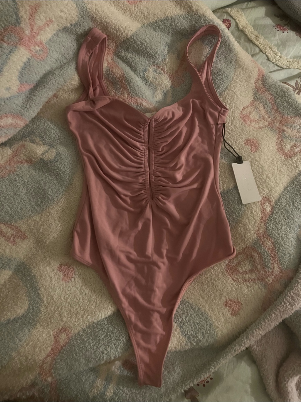 Astr The Label Mauve Pink One-Piece Bodysuit With Keyhole Cut Outs On Front